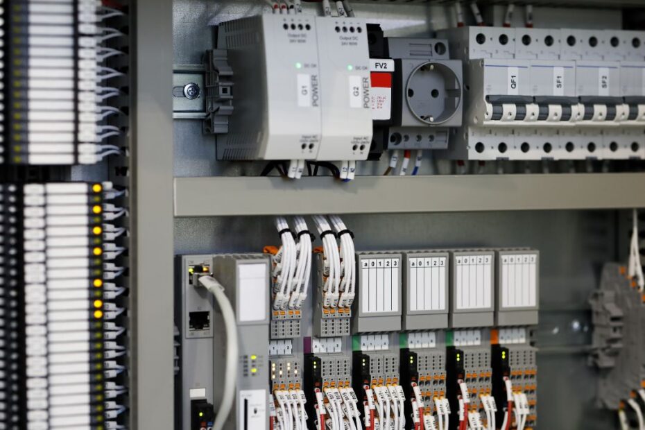 Image showcasing a PLC control panel, the central hub of factory automation, revolutionizing manufacturing processes with efficiency, flexibility, and intelligence. Explore how PLCs drive innovation in industrial landscapes.